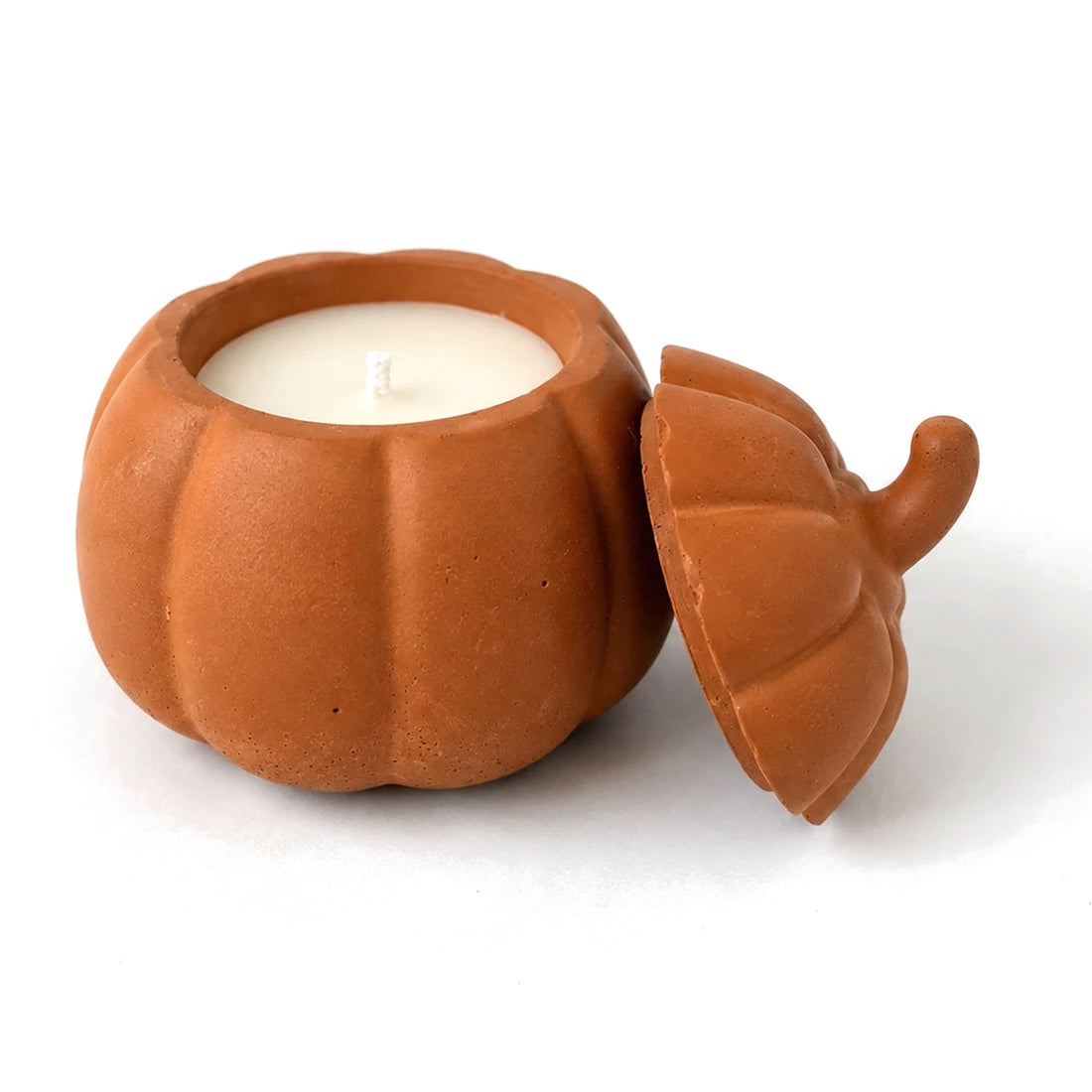 Orange concrete pumpkin candle with lid