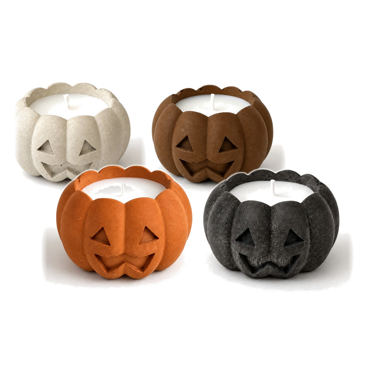 Jack-o'-lantern candles in all four colours: white, brown, orange and graphite (sold individually)